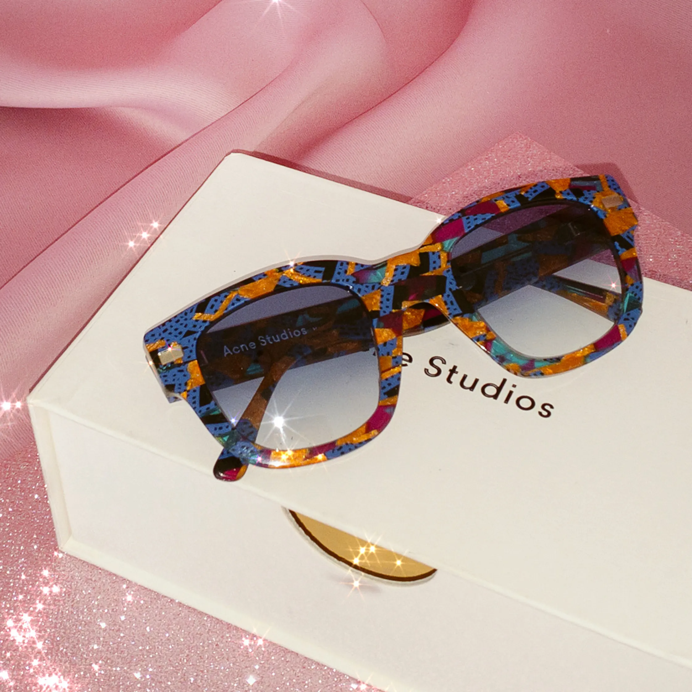 Product photography watches on pink glitter background